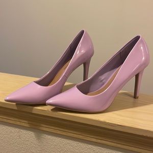 Christian Soriano never worn size 9 purple in color.